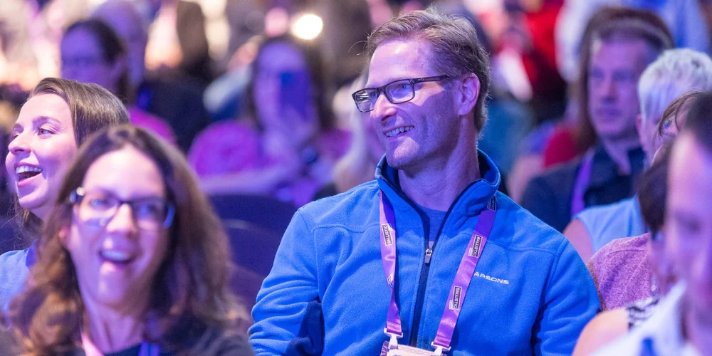 Attendee laughing 2023