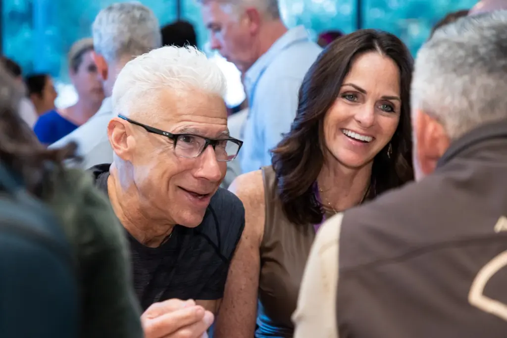Attendees sharing a laugh at Hack Your Health